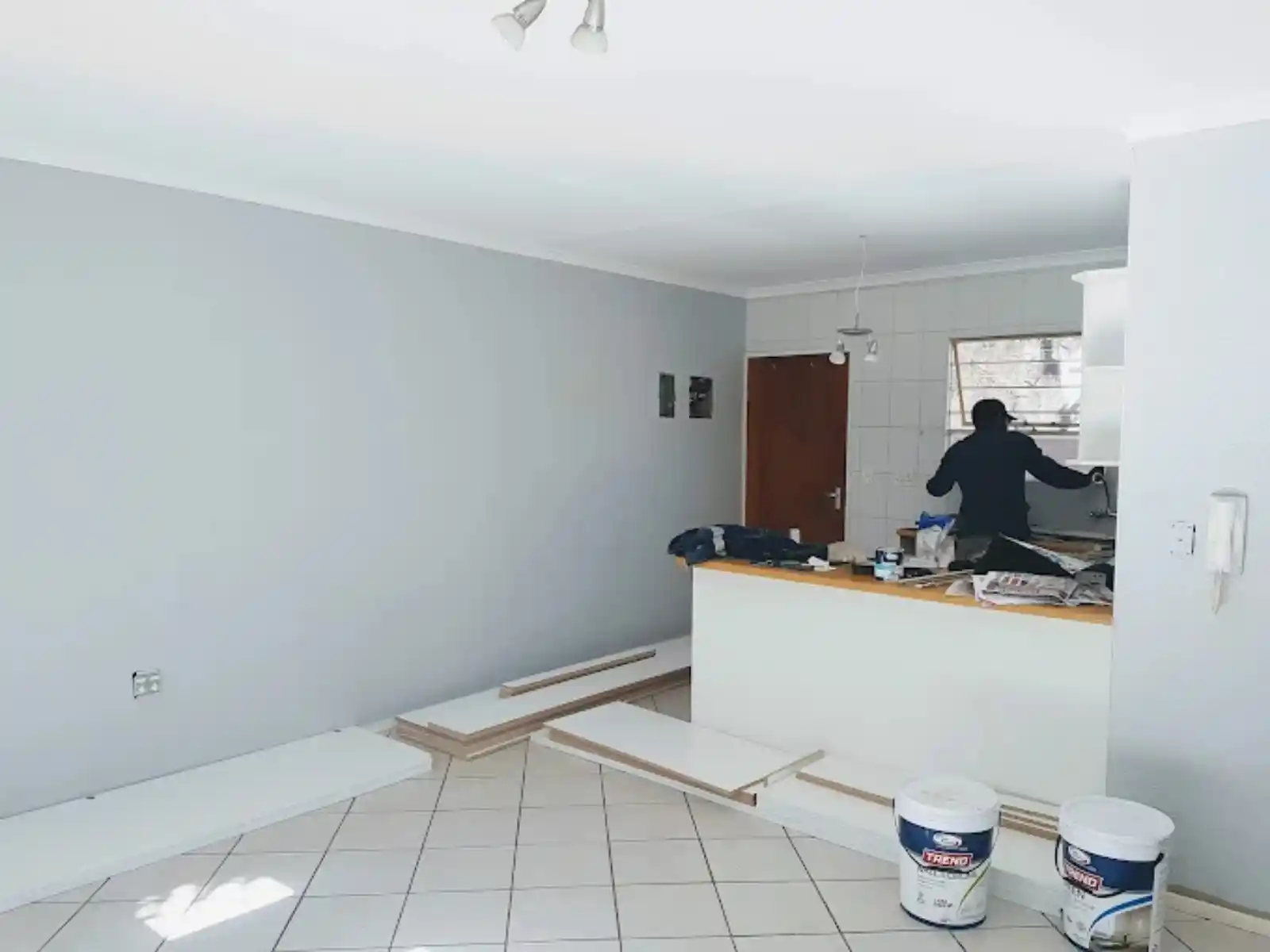 Interior room mid-renovation with new tiling and paintwork, Cape Town