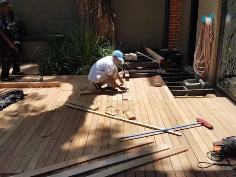 Team member installing a new deck